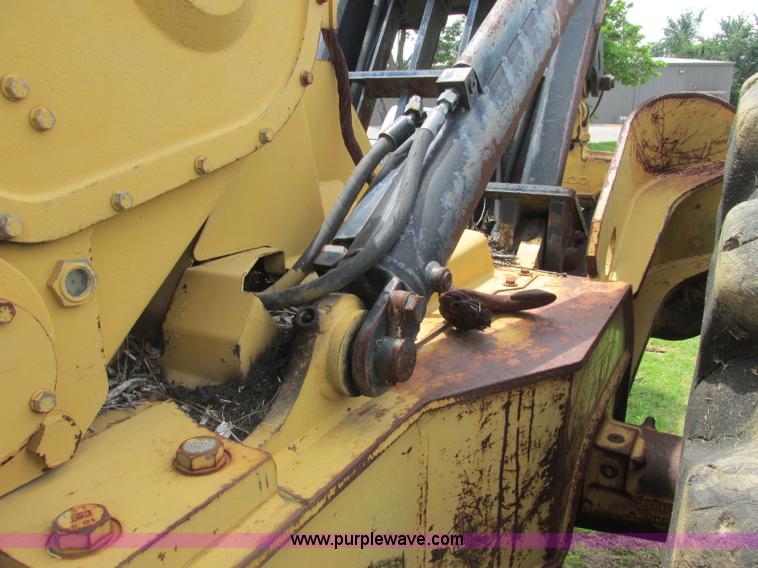 image for item J2500 2002 Caterpillar 525B grapple skidder
