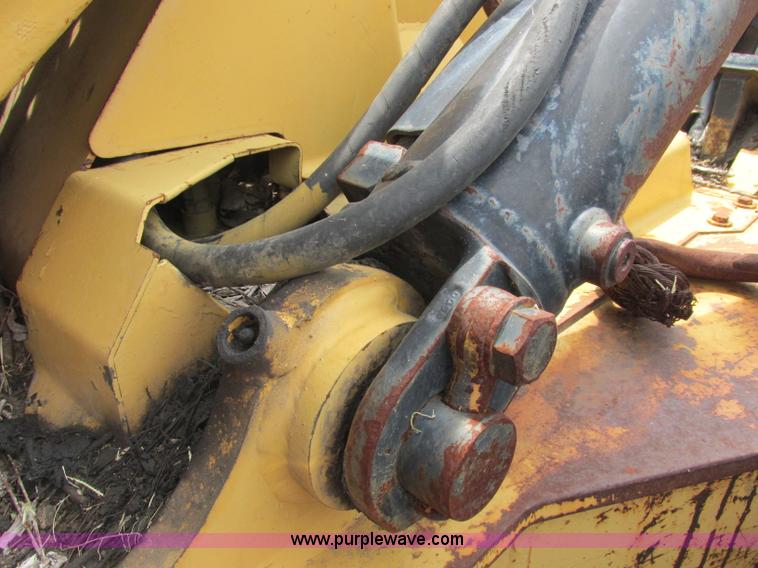image for item J2500 2002 Caterpillar 525B grapple skidder