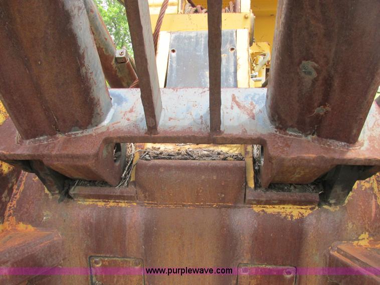 image for item J2500 2002 Caterpillar 525B grapple skidder