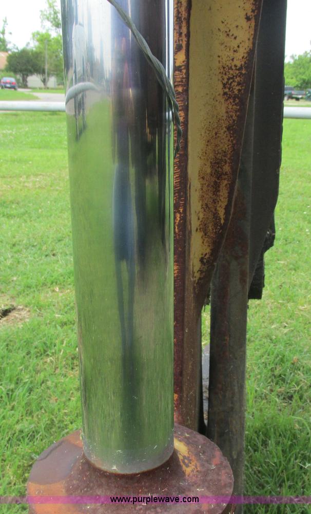 image for item J2500 2002 Caterpillar 525B grapple skidder