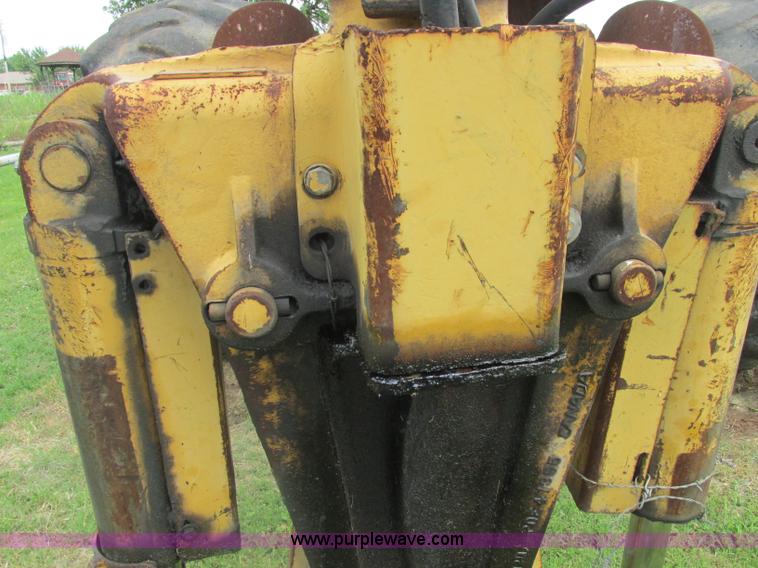 image for item J2500 2002 Caterpillar 525B grapple skidder
