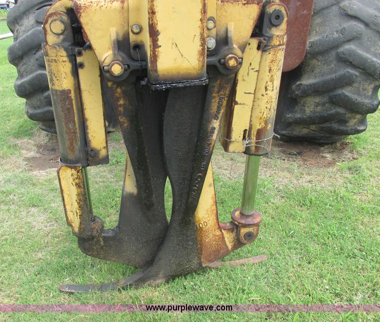 image for item J2500 2002 Caterpillar 525B grapple skidder