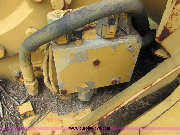 image for item J2500 2002 Caterpillar 525B grapple skidder