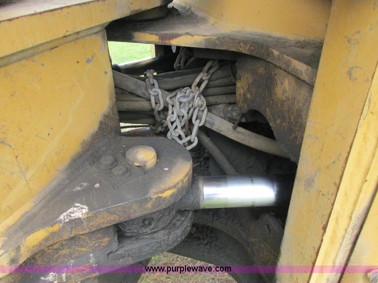 image for item J2500 2002 Caterpillar 525B grapple skidder