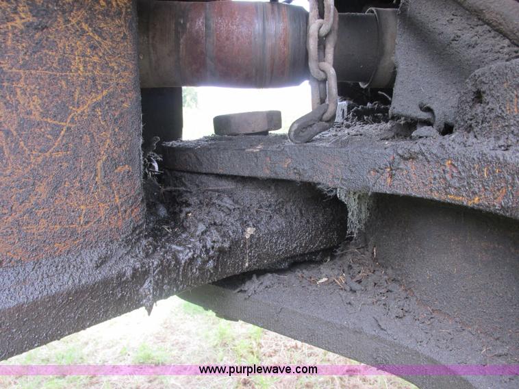 image for item J2500 2002 Caterpillar 525B grapple skidder