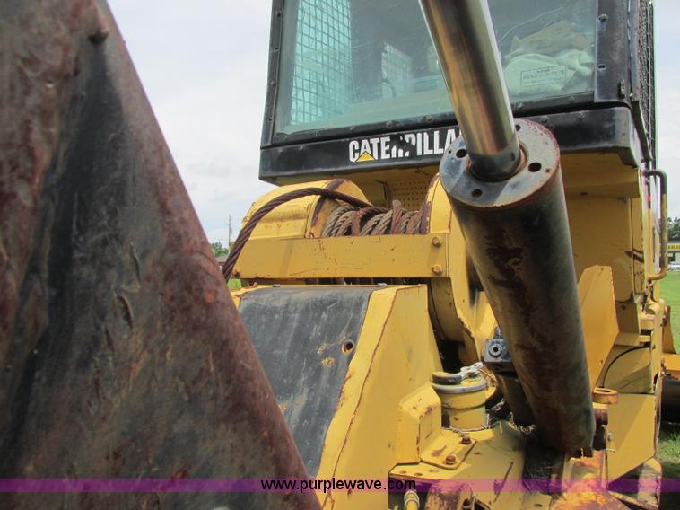 image for item J2500 2002 Caterpillar 525B grapple skidder