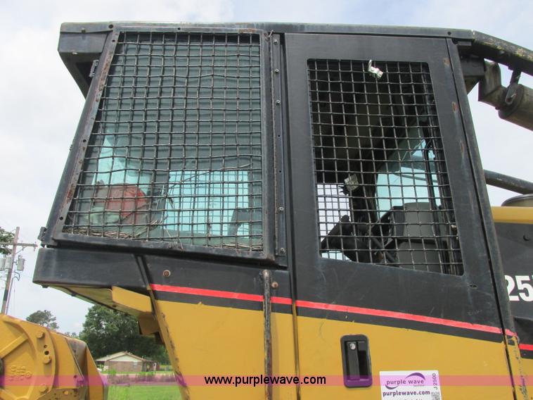 image for item J2500 2002 Caterpillar 525B grapple skidder