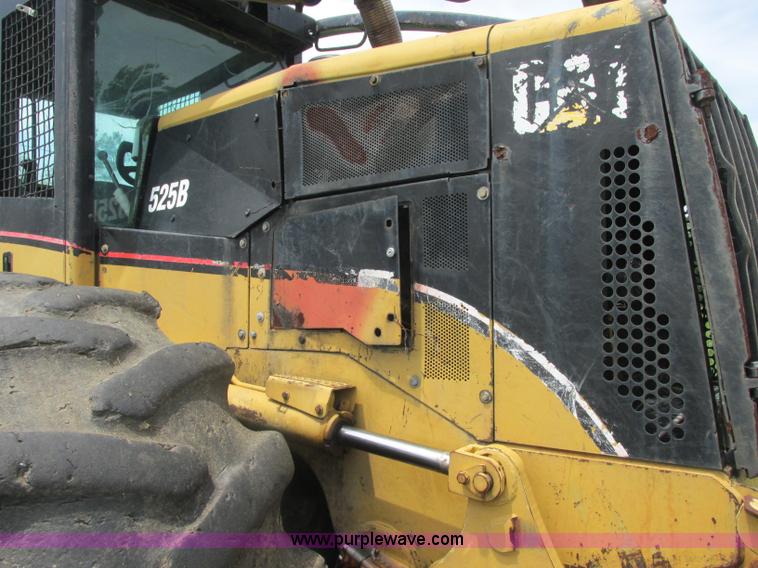 image for item J2500 2002 Caterpillar 525B grapple skidder