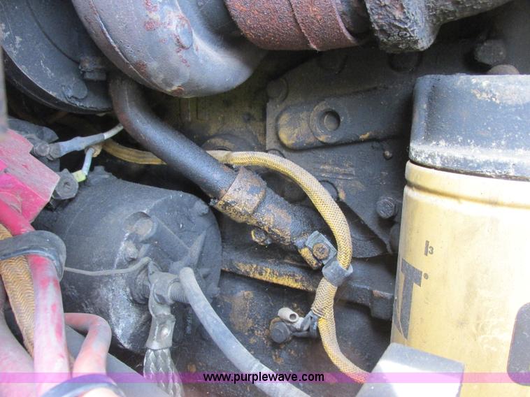 image for item J2500 2002 Caterpillar 525B grapple skidder