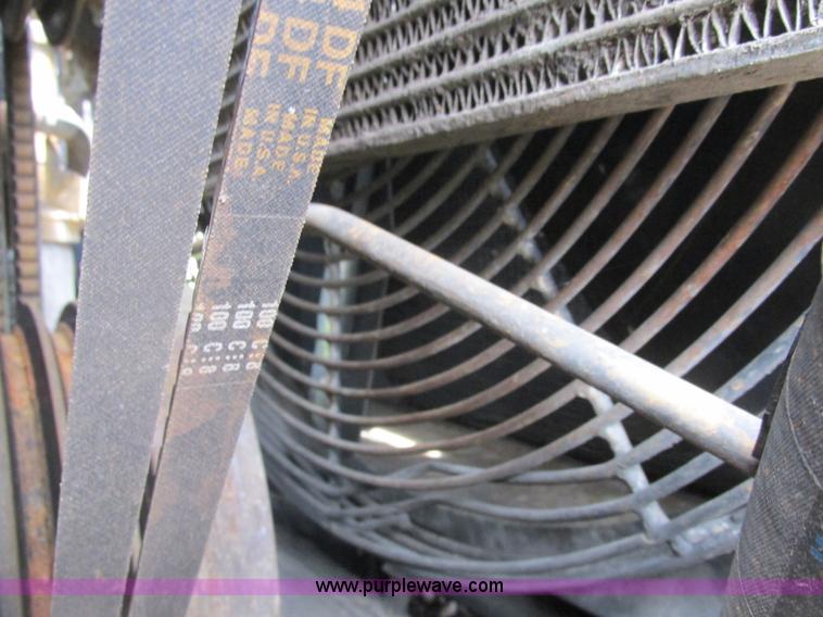 image for item J2500 2002 Caterpillar 525B grapple skidder