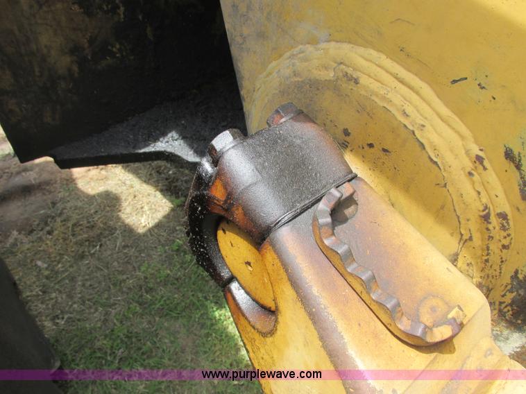 image for item J2500 2002 Caterpillar 525B grapple skidder