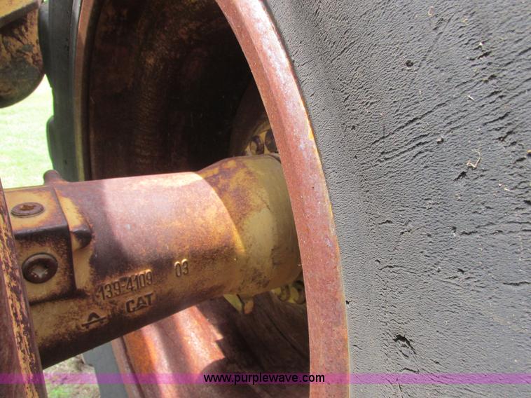 image for item J2500 2002 Caterpillar 525B grapple skidder