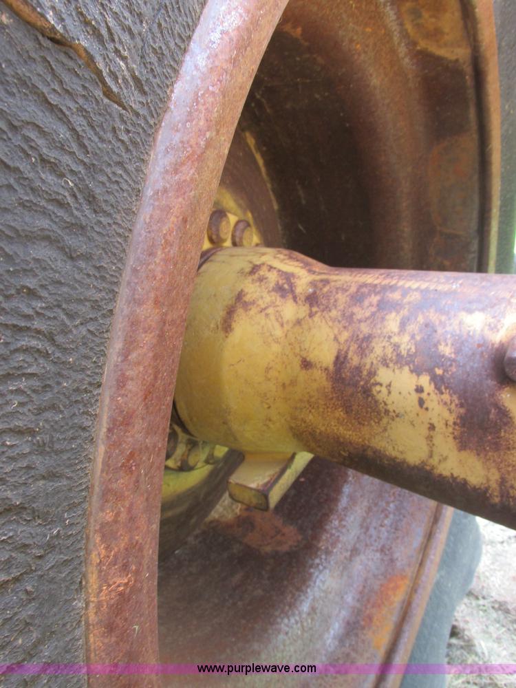 image for item J2500 2002 Caterpillar 525B grapple skidder