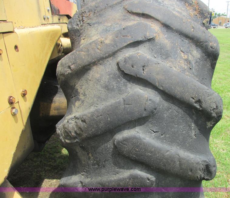 image for item J2500 2002 Caterpillar 525B grapple skidder