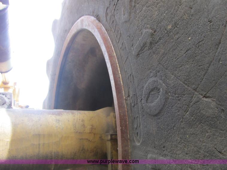 image for item J2500 2002 Caterpillar 525B grapple skidder