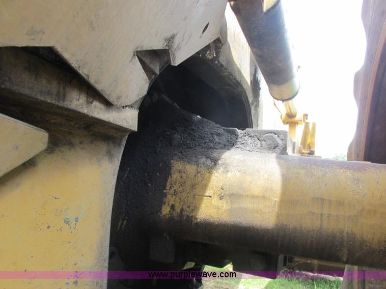 image for item J2500 2002 Caterpillar 525B grapple skidder