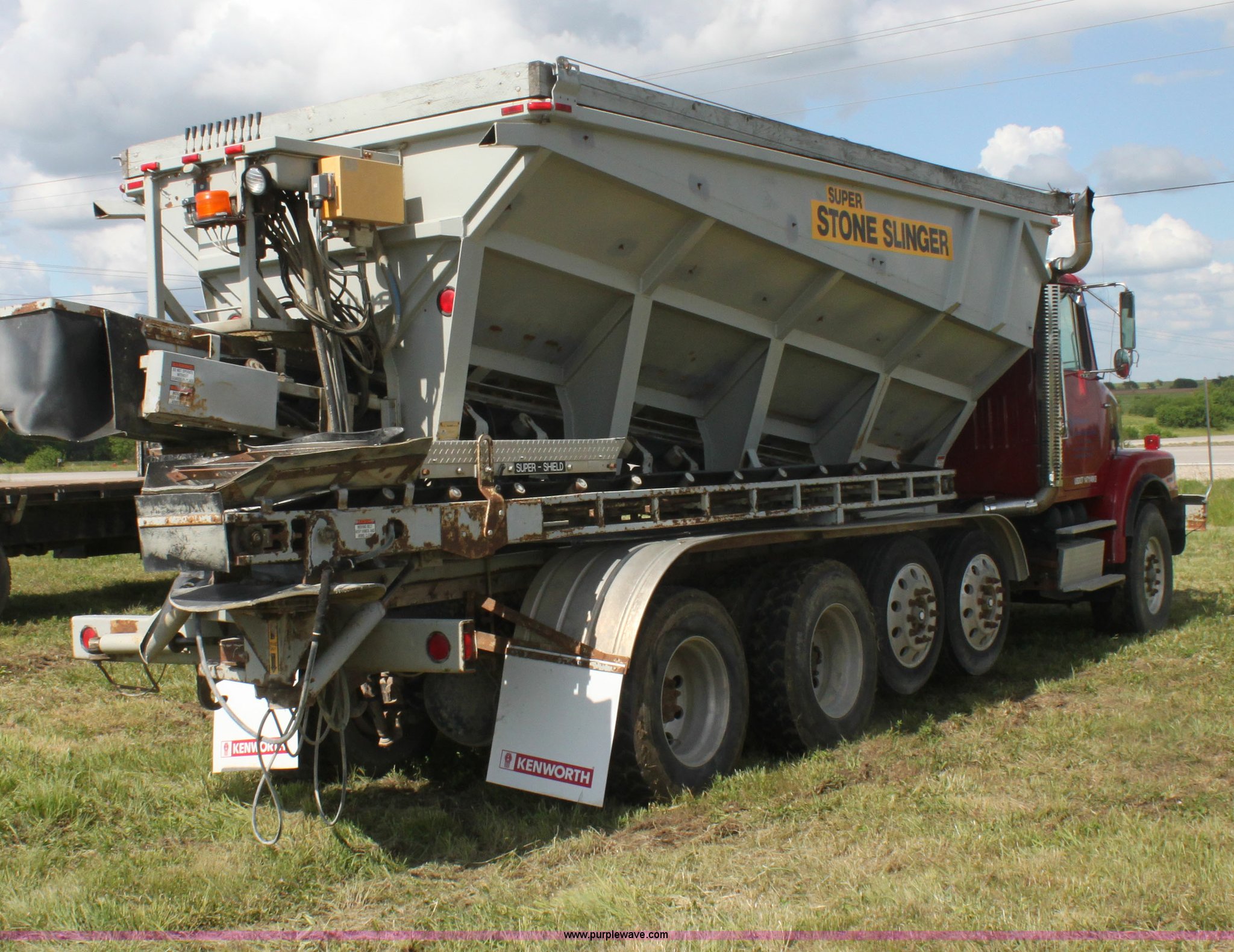 2001 Volvo WG Super Stone Slinger semi truck in New Strawn, KS Item