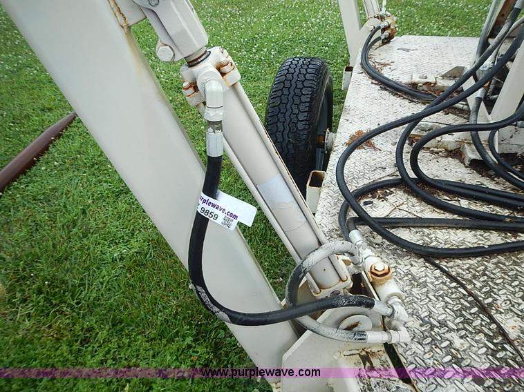 image for item AZ9859 Versa Lift tow behind man lift