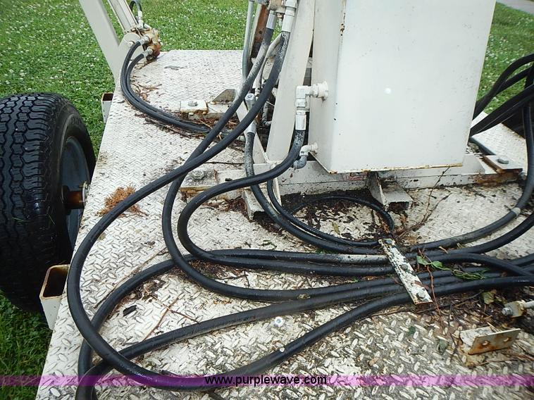 image for item AZ9859 Versa Lift tow behind man lift