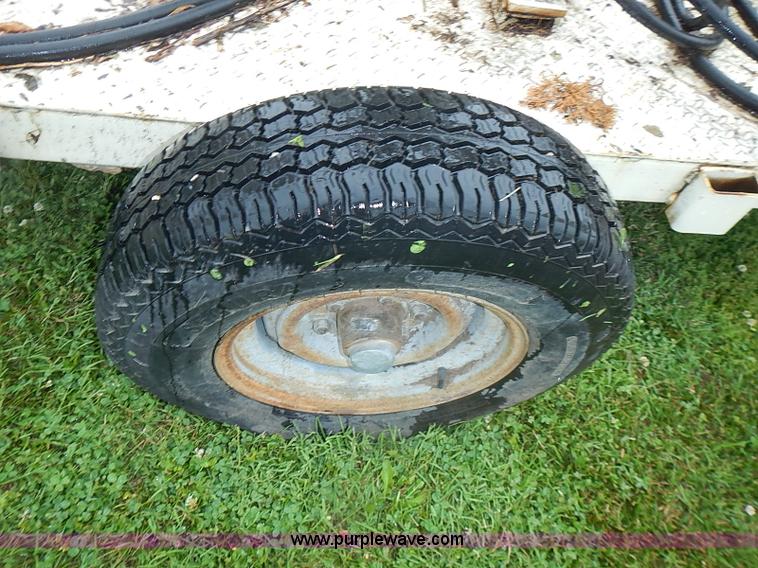 image for item AZ9859 Versa Lift tow behind man lift