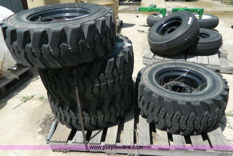 image for item AL9884 (4) 30.5x12.5-16.5 NHS tires and wheels