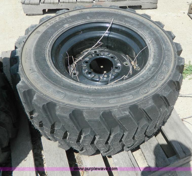 image for item AL9884 (4) 30.5x12.5-16.5 NHS tires and wheels