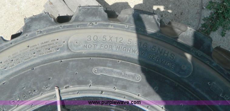 image for item AL9884 (4) 30.5x12.5-16.5 NHS tires and wheels