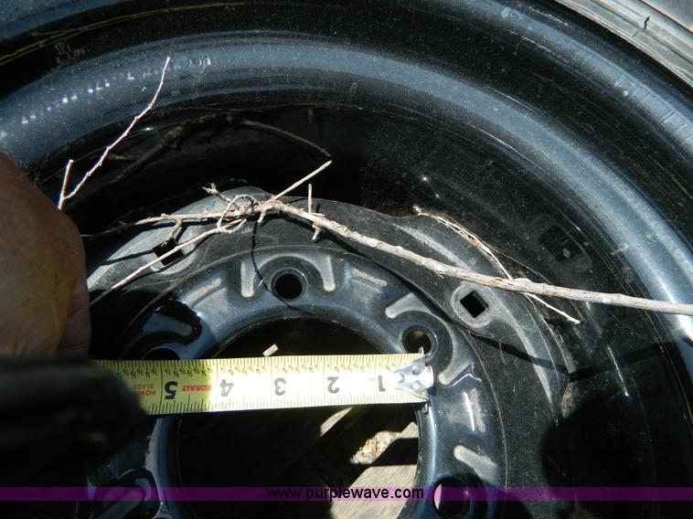 image for item AL9884 (4) 30.5x12.5-16.5 NHS tires and wheels