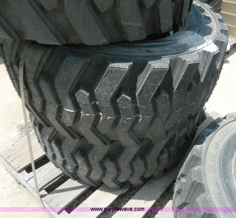 image for item AL9884 (4) 30.5x12.5-16.5 NHS tires and wheels