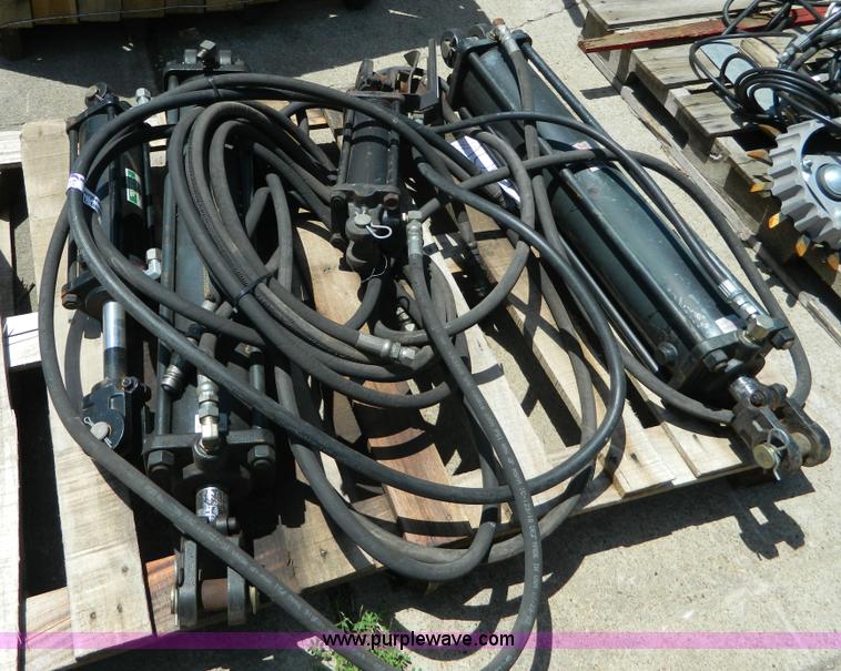 image for item AL9888 (4) hydraulic cylinders