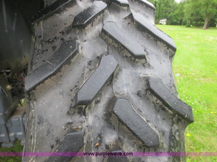 image for item D2083 1997 New Holland 7740SLE MFWD tractor