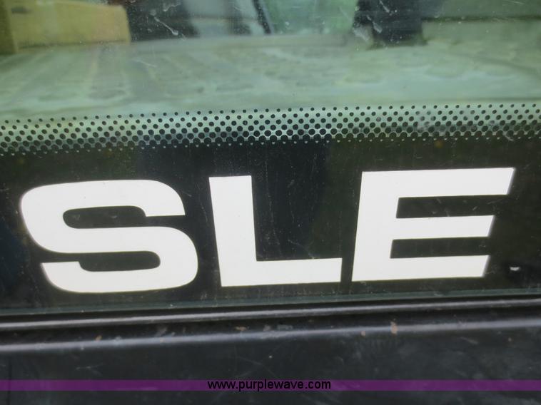 image for item D2083 1997 New Holland 7740SLE MFWD tractor