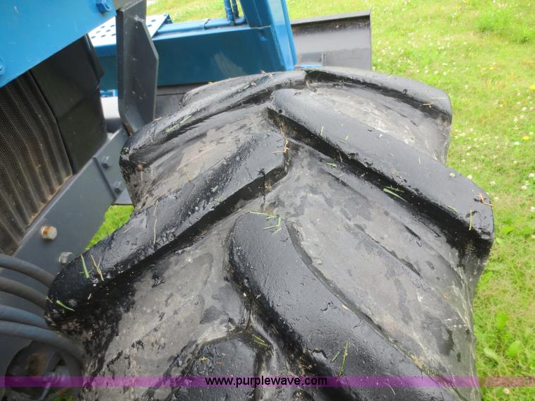 image for item D2083 1997 New Holland 7740SLE MFWD tractor