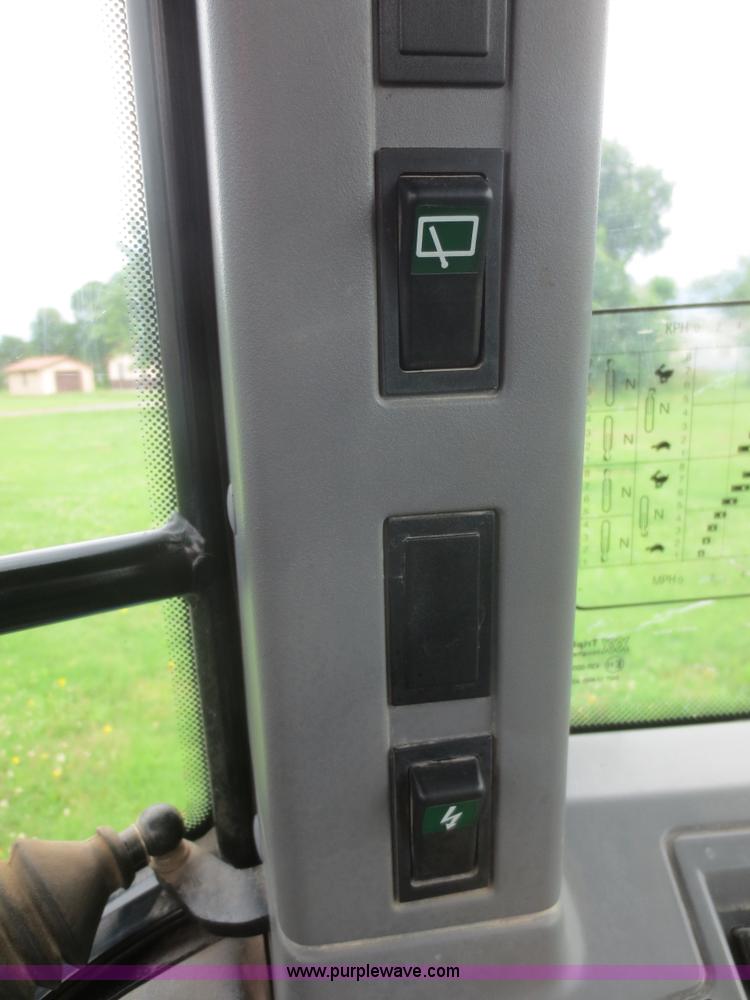 image for item D2083 1997 New Holland 7740SLE MFWD tractor