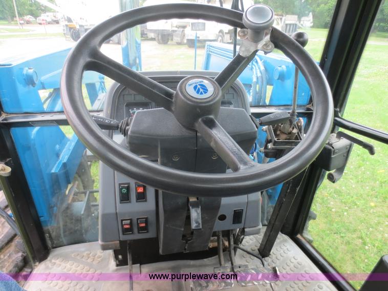 image for item D2083 1997 New Holland 7740SLE MFWD tractor