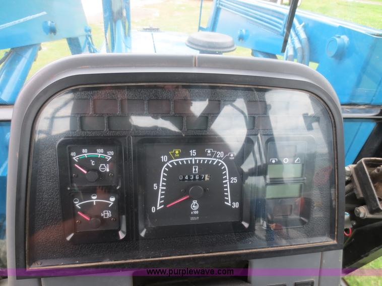 image for item D2083 1997 New Holland 7740SLE MFWD tractor