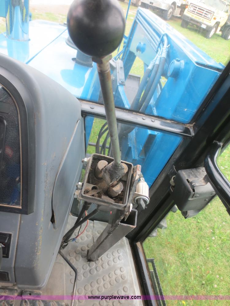 image for item D2083 1997 New Holland 7740SLE MFWD tractor