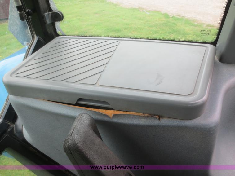 image for item D2083 1997 New Holland 7740SLE MFWD tractor
