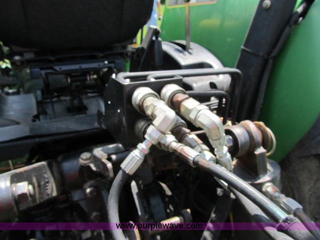 image for item F4910 2005 John Deere 4720 MFWD tractor