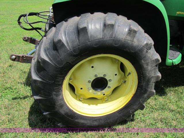 image for item F4910 2005 John Deere 4720 MFWD tractor