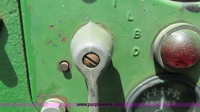 image for item G9278 1957 John Deere 720 tractor