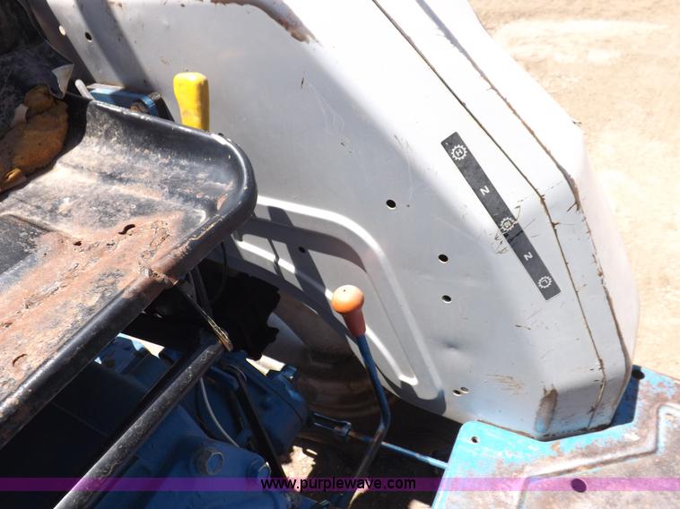 image for item H1809 1996 New Holland 1715 MFWD tractor