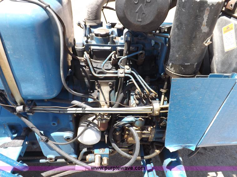 image for item H1809 1996 New Holland 1715 MFWD tractor