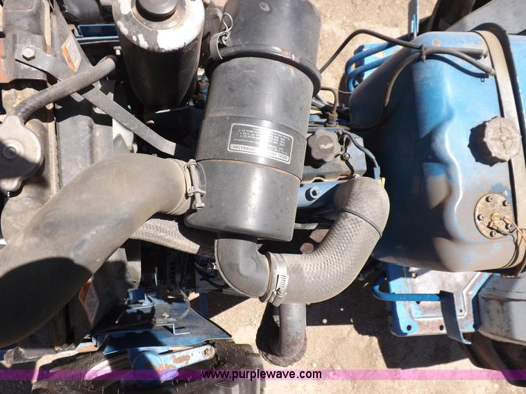 image for item H1809 1996 New Holland 1715 MFWD tractor