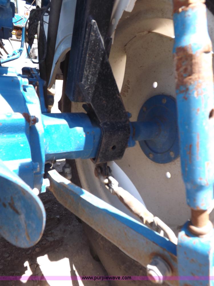 image for item H1809 1996 New Holland 1715 MFWD tractor