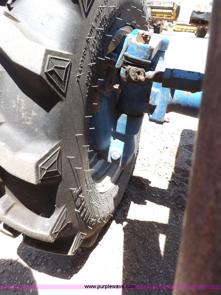 image for item H1809 1996 New Holland 1715 MFWD tractor