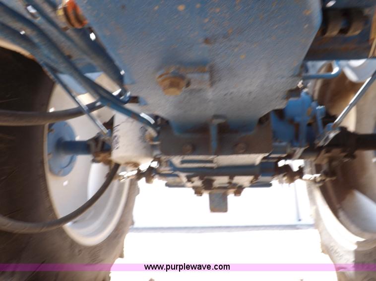 image for item H1809 1996 New Holland 1715 MFWD tractor