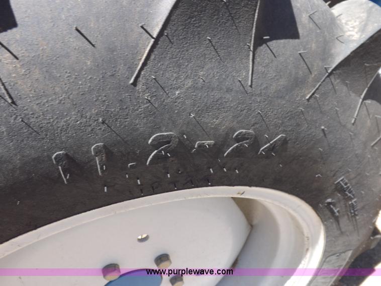 image for item H1809 1996 New Holland 1715 MFWD tractor