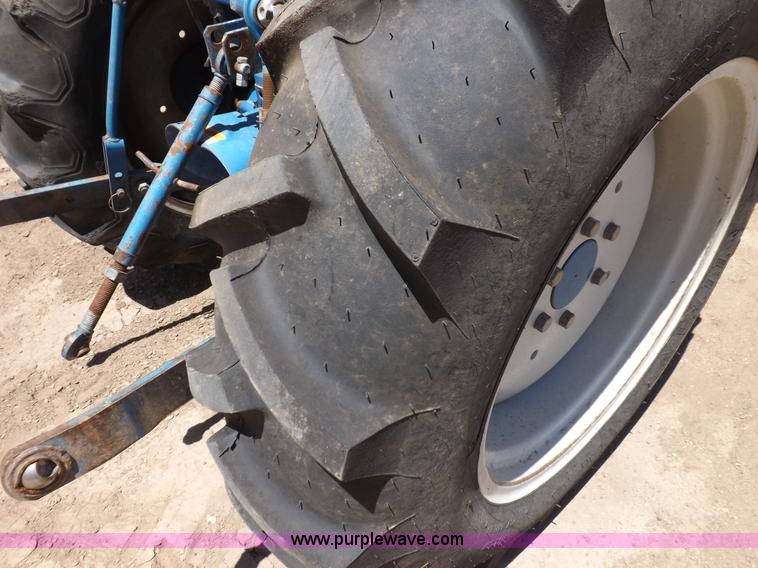 image for item H1809 1996 New Holland 1715 MFWD tractor