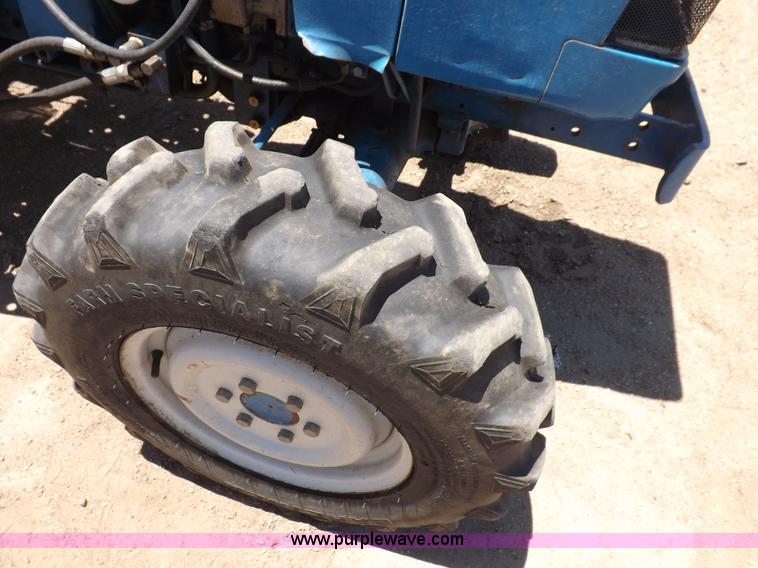 image for item H1809 1996 New Holland 1715 MFWD tractor